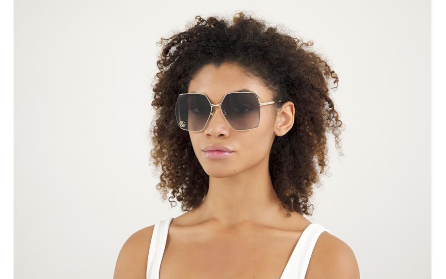 Gucci GG0817S 001 65 Sunglasses | Glasses Station display picture 1